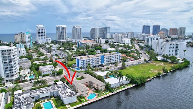 birds eye view of property featuring a water view