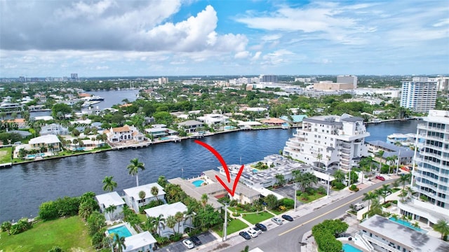 drone / aerial view with a water view