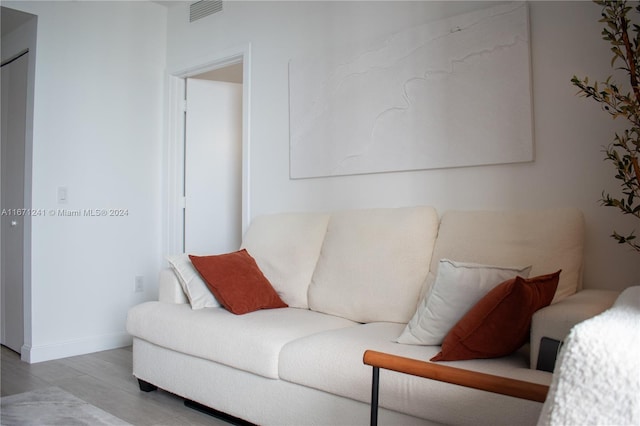 living room with light hardwood / wood-style floors