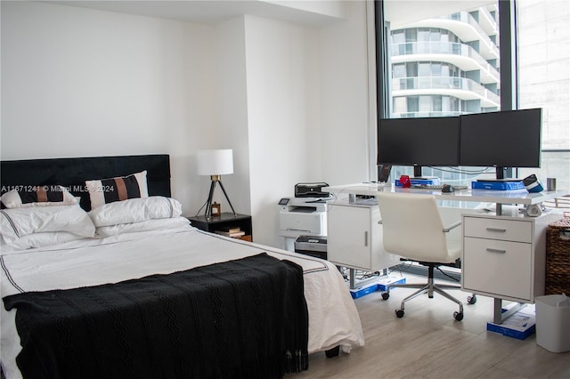 bedroom featuring light hardwood / wood-style flooring