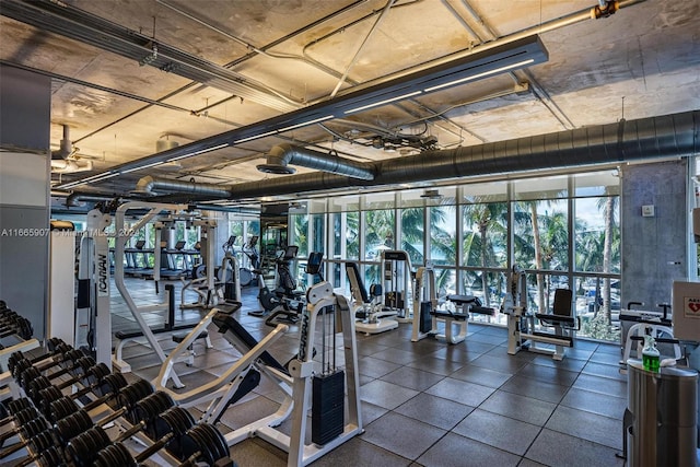 workout area with floor to ceiling windows