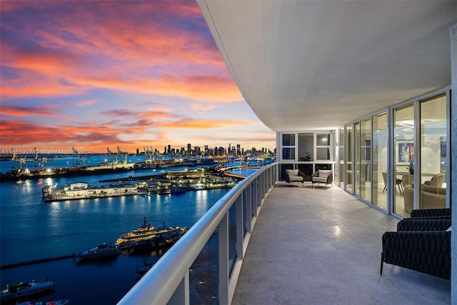 balcony at dusk with a water view