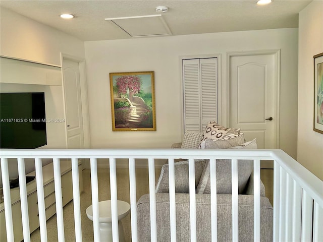 unfurnished bedroom featuring carpet floors and a textured ceiling