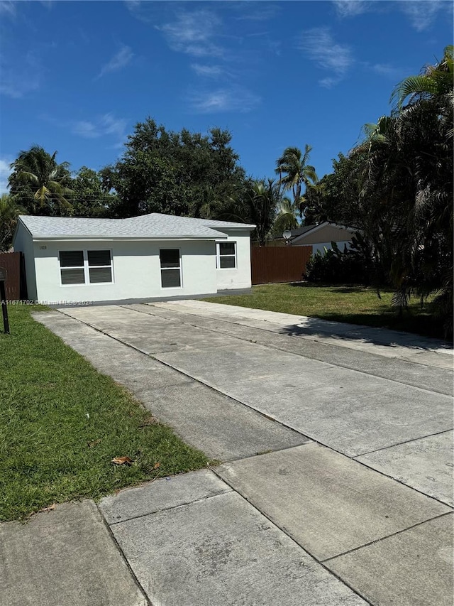 garage featuring a yard