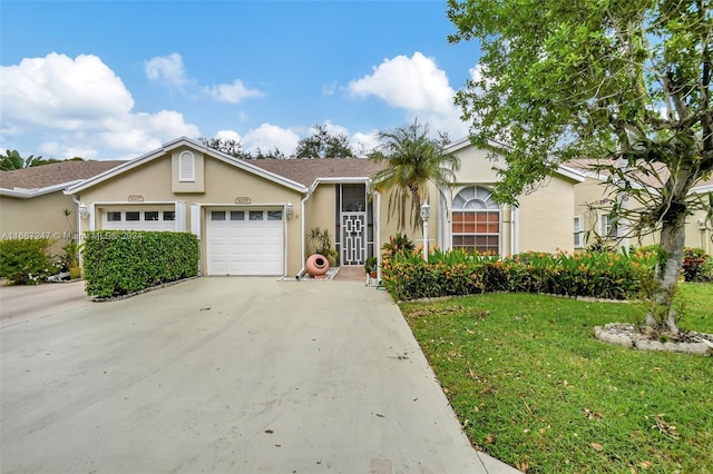 single story home with a front lawn and a garage