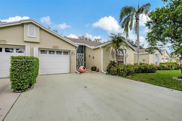 single story home with a garage