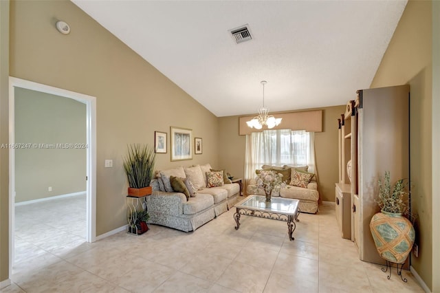 tiled living room with an inviting chandelier and high vaulted ceiling