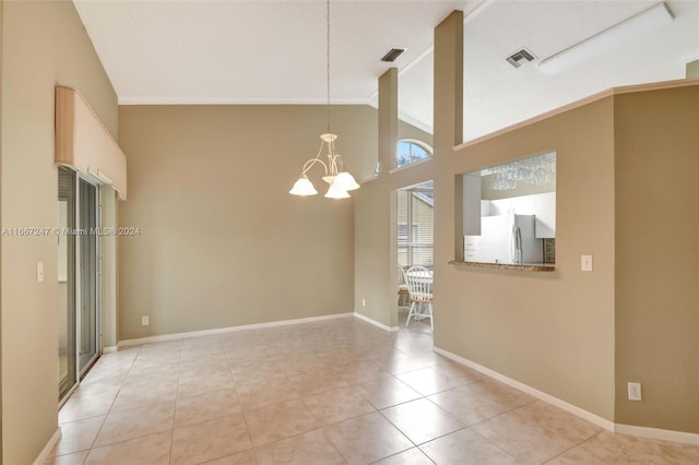 unfurnished room with a notable chandelier, crown molding, light tile patterned floors, and high vaulted ceiling