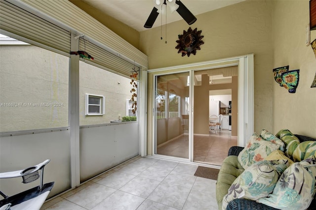 sunroom / solarium with ceiling fan