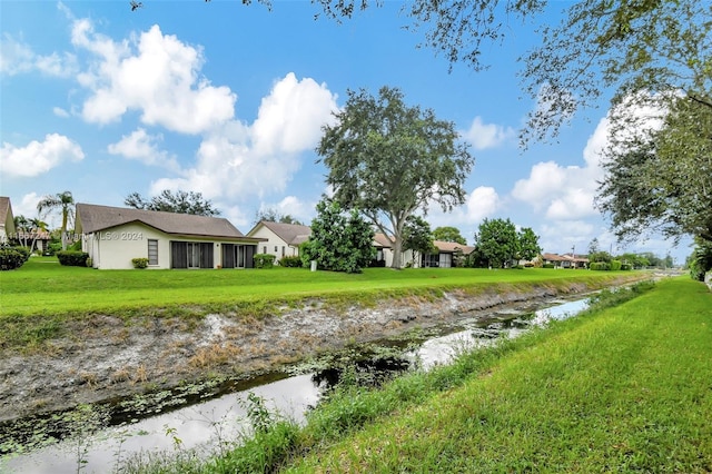 view of yard with a water view