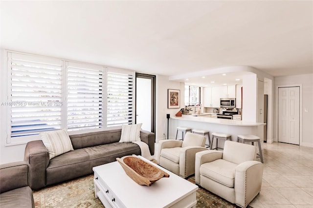 1586 S Ocean Ln Unit 125, Fort Lauderdale, FL 33316 - living room with light tile patterned flooring
