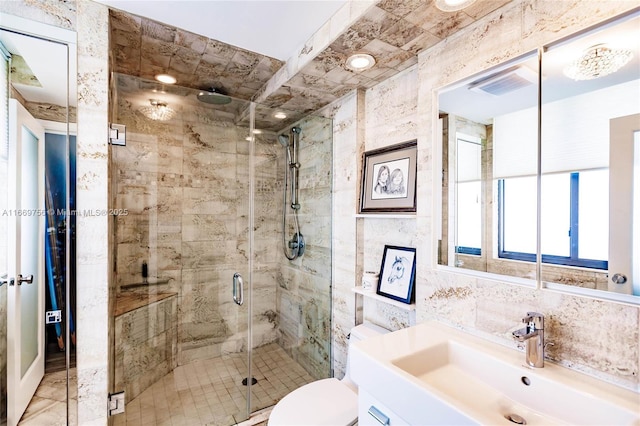 1586 S Ocean Ln Unit 125, Fort Lauderdale, FL 33316 - full bath featuring vanity, a shower stall, toilet, and visible vents