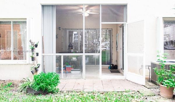 doorway to property with cooling unit