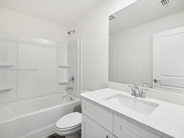 full bathroom featuring vanity, toilet, and bathing tub / shower combination