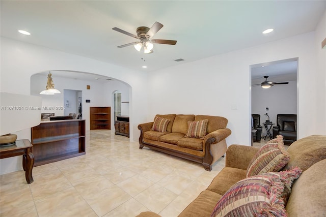 living room with ceiling fan