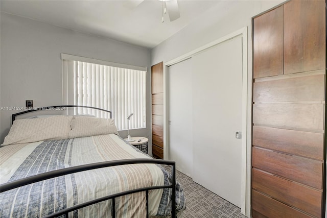 bedroom featuring ceiling fan and a closet