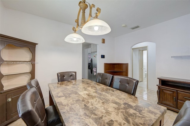 dining room with light tile patterned floors