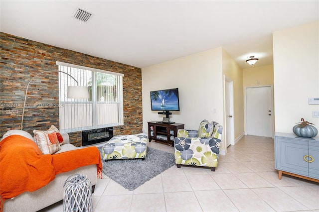 tiled living room with a fireplace