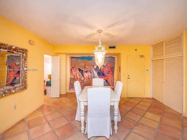 dining area featuring tile patterned floors