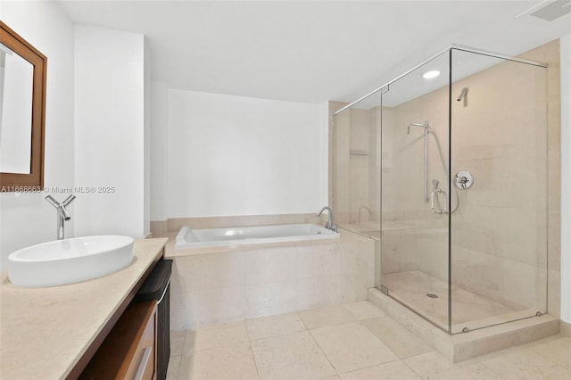 full bath with visible vents, tile patterned floors, a garden tub, vanity, and a shower stall