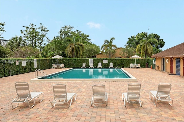 view of pool with a patio