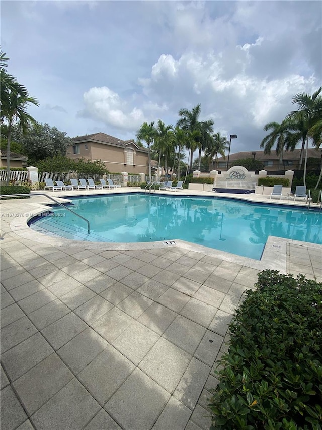 view of pool featuring a patio area