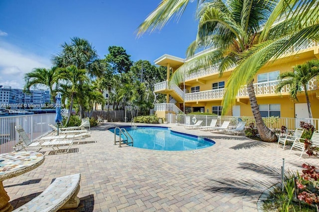 view of pool featuring a patio area