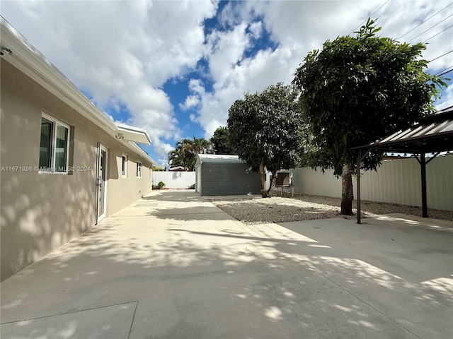 exterior space with a shed