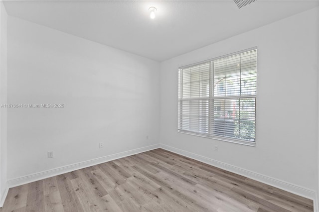 11959 SW 26th Ct, Miramar, FL 33025 - unfurnished room featuring baseboards, visible vents, and light wood-style floors