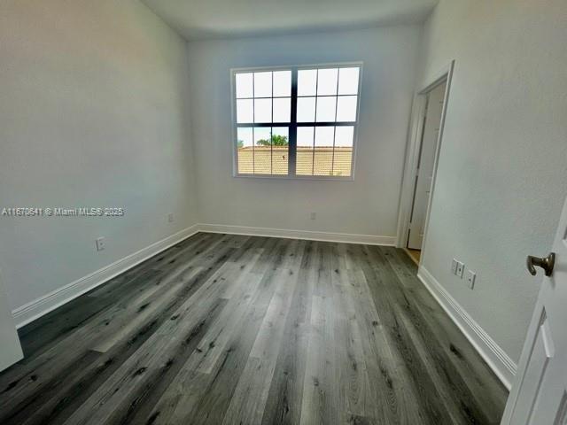 unfurnished living room featuring light tile patterned floors