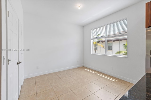 11959 SW 26th Ct, Miramar, FL 33025 - empty room featuring light tile patterned flooring and baseboards