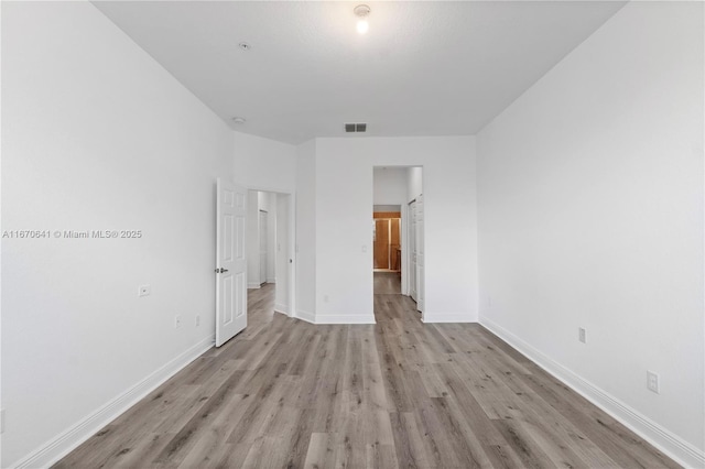 11959 SW 26th Ct, Miramar, FL 33025 - empty room featuring wood finished floors and baseboards