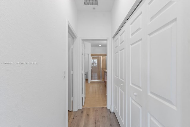 11959 SW 26th Ct, Miramar, FL 33025 - hallway featuring visible vents and light wood-style floors