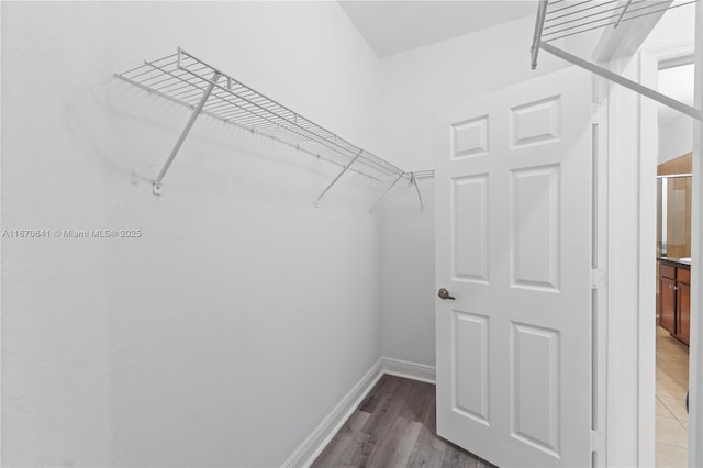 11959 SW 26th Ct, Miramar, FL 33025 - walk in closet featuring light wood-type flooring