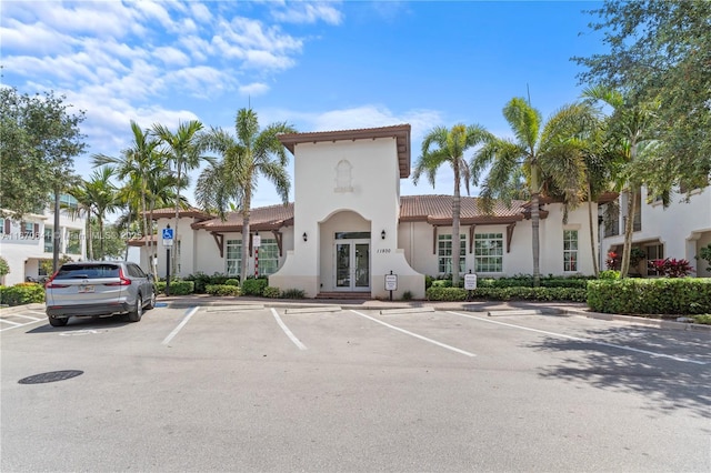 11959 SW 26th Ct, Miramar, FL 33025 - bathroom featuring tile patterned floors, vanity, toilet, and tub / shower combination