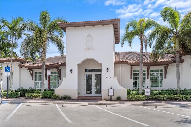 11959 SW 26th Ct, Miramar, FL 33025 - view of property featuring uncovered parking