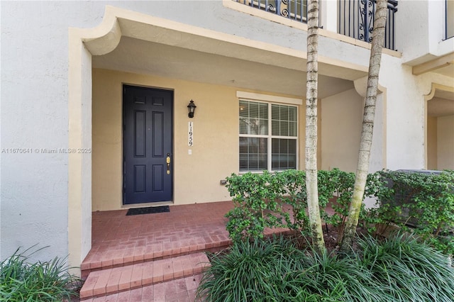 11959 SW 26th Ct, Miramar, FL 33025 - entrance to property with stucco siding and covered porch