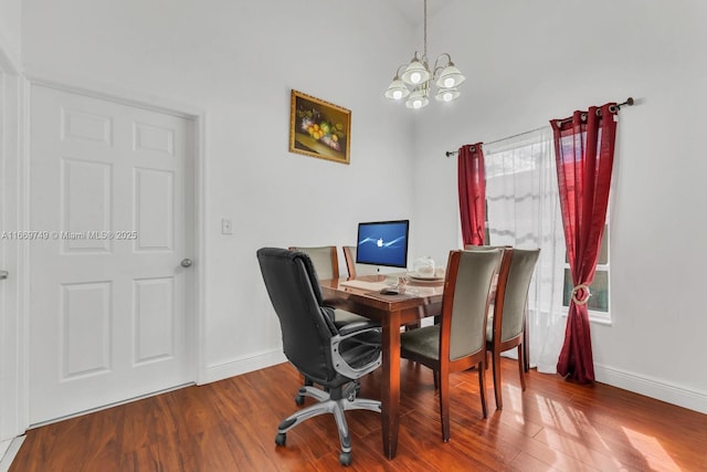 office featuring plenty of natural light, a notable chandelier, and hardwood / wood-style flooring