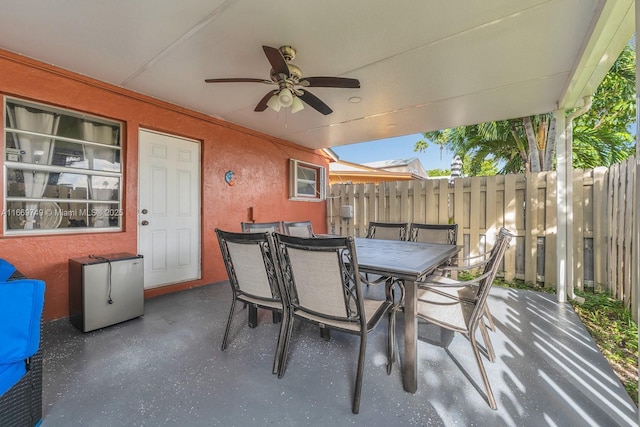 view of patio with ceiling fan