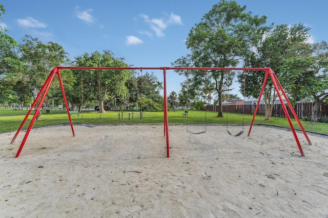 view of playground with a yard