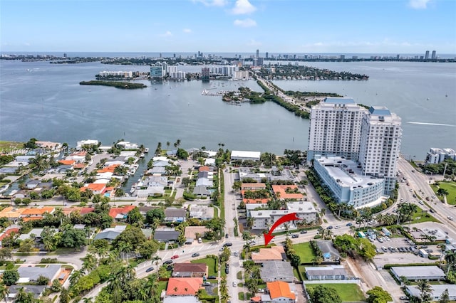 drone / aerial view with a water view