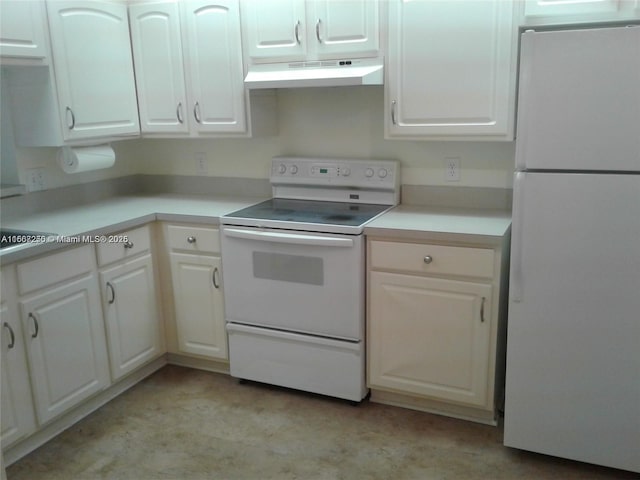 701 SW 142nd Ave Unit 104S, Pembroke Pines, FL 33027 - kitchen with white appliances, under cabinet range hood, white cabinetry, and light countertops