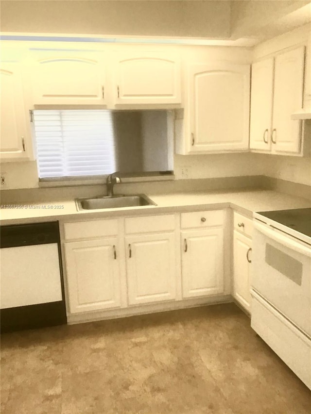 701 SW 142nd Ave Unit 104S, Pembroke Pines, FL 33027 - kitchen featuring white electric range, sink, and white cabinets