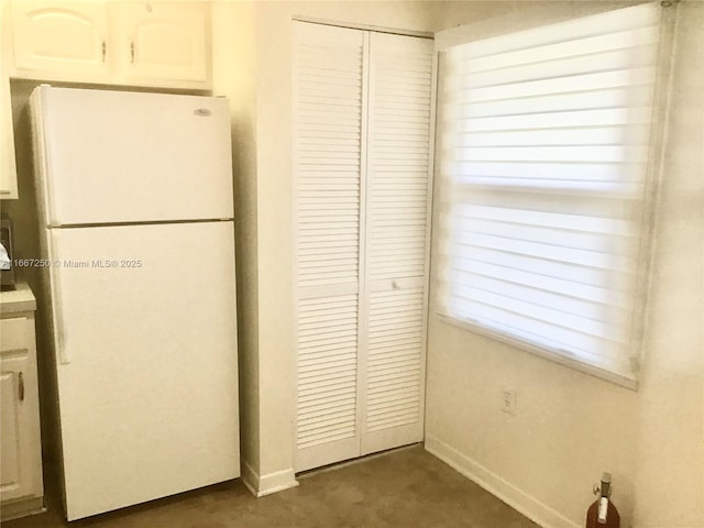 701 SW 142nd Ave Unit 104S, Pembroke Pines, FL 33027 - kitchen with white cabinetry and white refrigerator