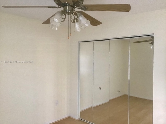 701 SW 142nd Ave Unit 104S, Pembroke Pines, FL 33027 - unfurnished bedroom featuring a closet and ceiling fan