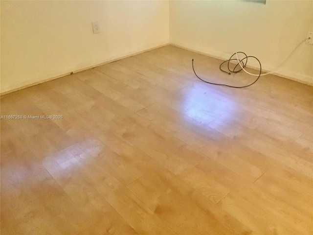 701 SW 142nd Ave Unit 104S, Pembroke Pines, FL 33027 - unfurnished room featuring wood-type flooring