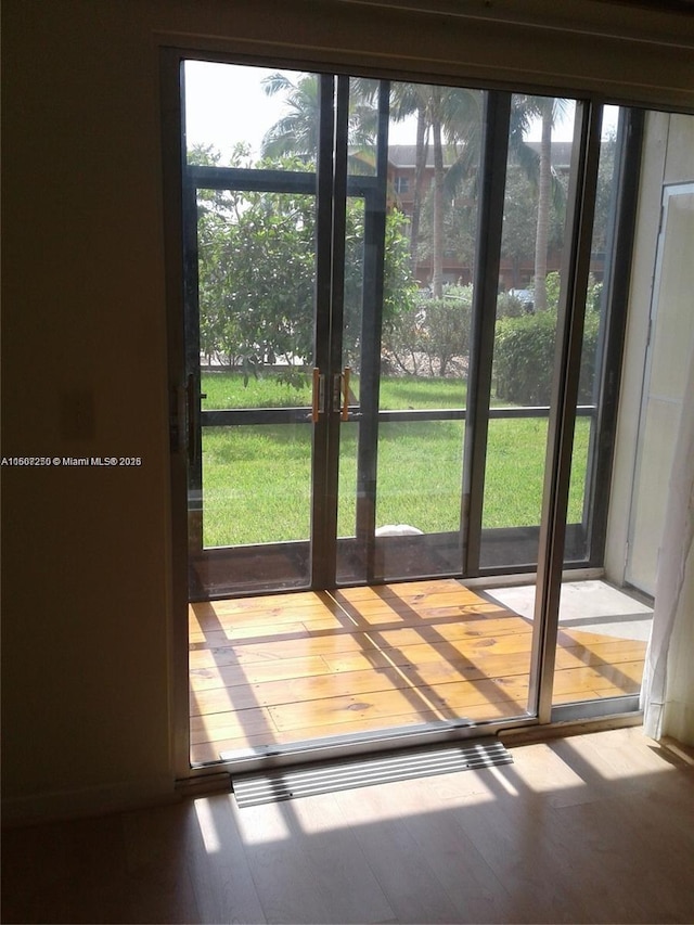 701 SW 142nd Ave Unit 104S, Pembroke Pines, FL 33027 - doorway featuring hardwood / wood-style floors