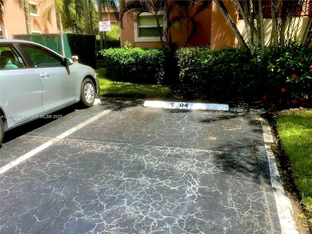 701 SW 142nd Ave Unit 104S, Pembroke Pines, FL 33027 - view of uncovered parking lot
