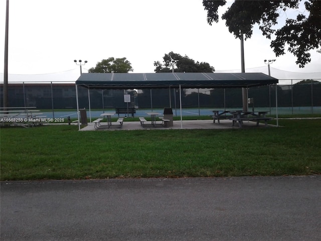 701 SW 142nd Ave Unit 104S, Pembroke Pines, FL 33027 - view of property's community featuring a yard