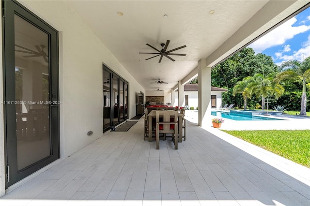 view of patio / terrace with ceiling fan